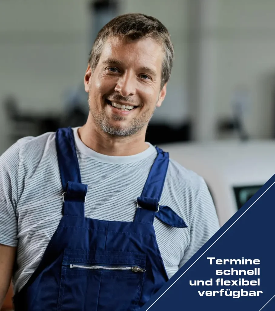 Freundlicher Kfz-Mechaniker in Autowerkstatt Glüsingen bei Seevetal